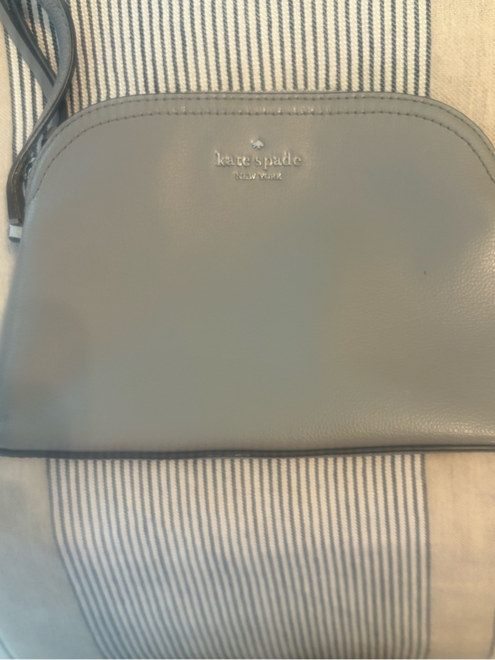 Kate Spade Payton dome crossbody bag in gray/light taupe color